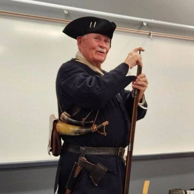 Retired Colonel John Dwyer, in Revolutionary War militia dress, presents a program on New Jersey’s role in the war.